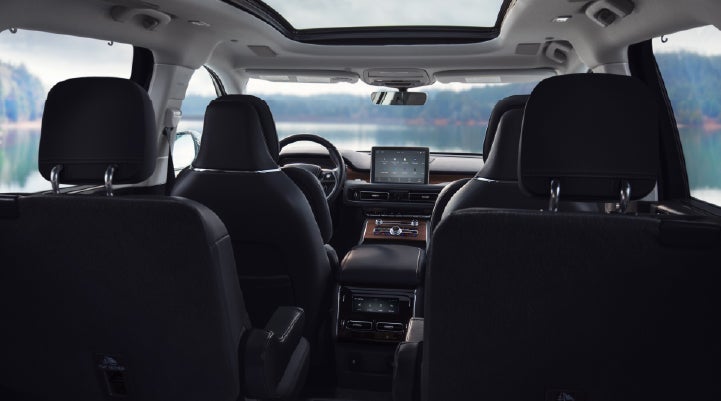 The interior of a 2024 Lincoln Aviator® SUV from behind the second row | Empire Lincoln of Huntington in Huntington NY