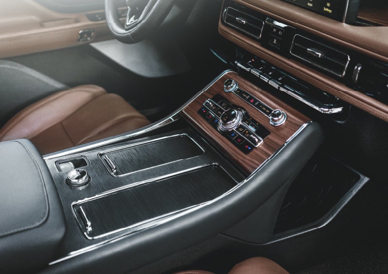 The front center console of a 2024 Lincoln Aviator® SUV is shown | Empire Lincoln of Huntington in Huntington NY