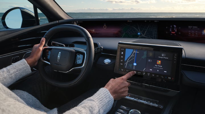 The driver of a 2024 Lincoln Nautilus® SUV interacts with the new Lincoln Digital Experience. | Empire Lincoln of Huntington in Huntington NY